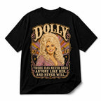 Dolly Parton portrait tribute graphic on black tee, white background
