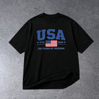 USA 250TH ANNIVERSARY 1776–2026 PATRIOTIC GRAPHIC T-SHIRT on light gray concrete