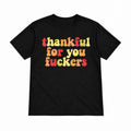 Thankful for You Fuckers retro graphic T-shirt in black, front view on a white background