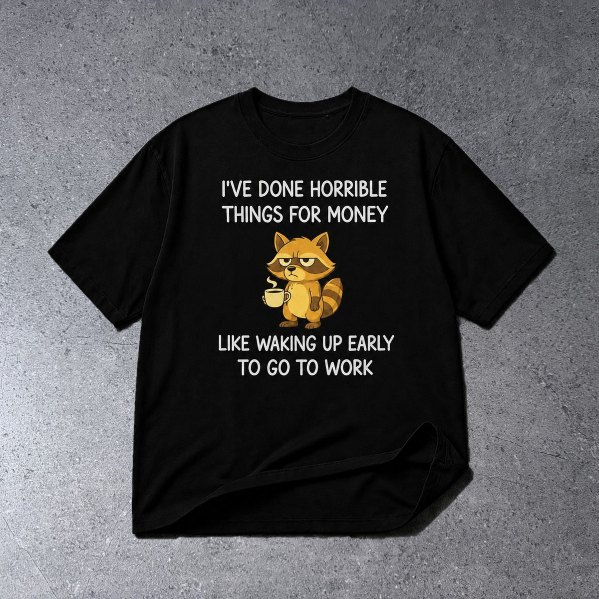 FUNNY RACCOON COFFEE QUOTE GRAPHIC T-SHIRT on light gray concrete