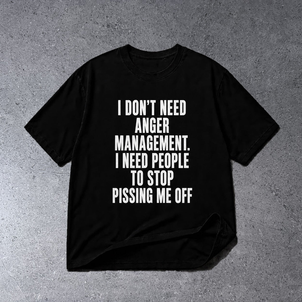 I DON'T NEED ANGER MANAGEMENT FUNNY GRAPHIC T-SHIRT on light gray concrete