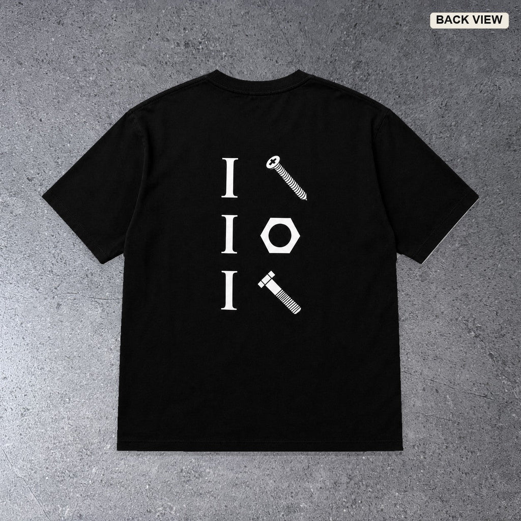 I Screw, I Nut, I Bolt black graphic T-shirt back view on light gray concrete