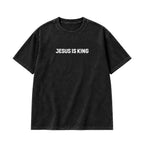 Jesus Is King T-Shirt in Washed Black, front view on white background